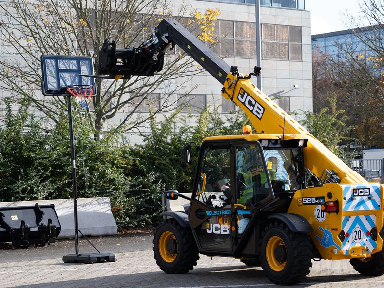 Image for Drive Experience, JCB telescopic handler on basketball hoop