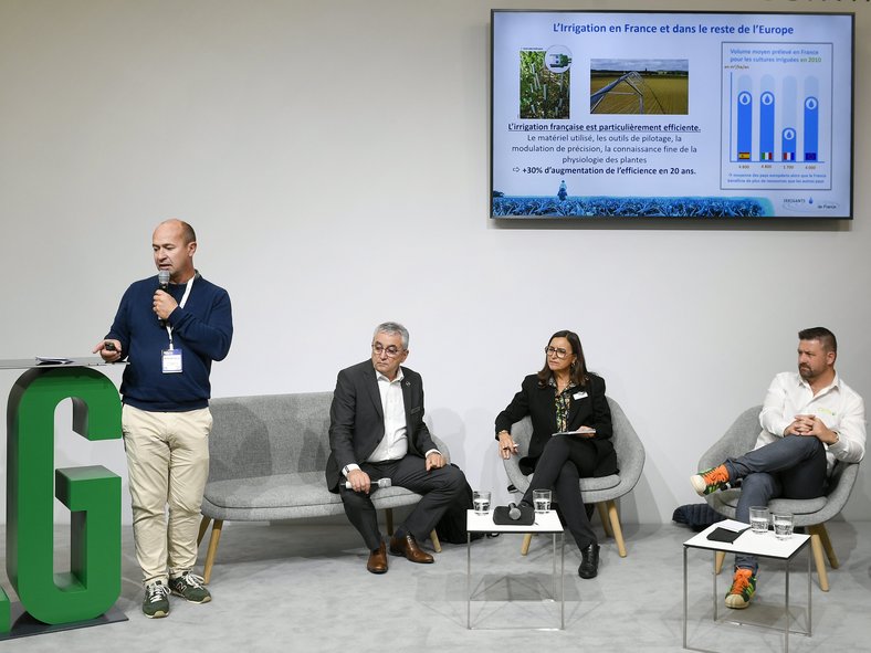 Picture of International Farmers Day, speakers with panellists on stage